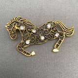 Mio Queena Rhinestone Inlaid Hollow Design Horse Brooch